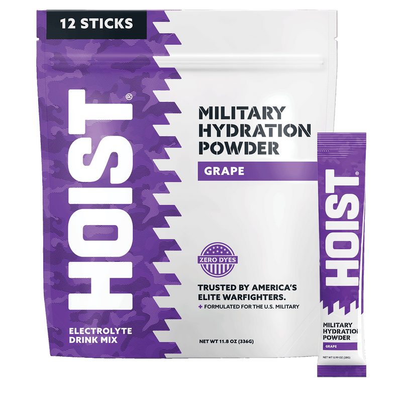 Purple package of Hoist Military Hydration Powder with a single stick pack on a white background