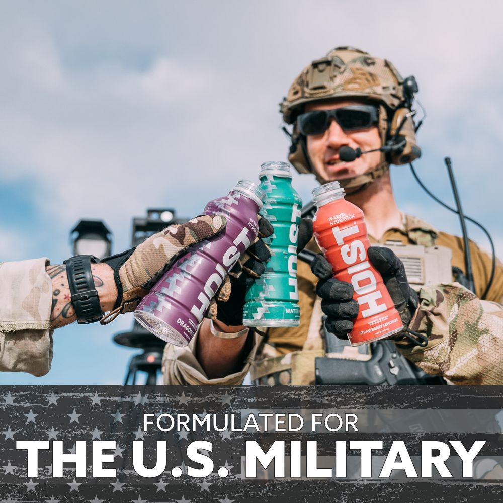 Person in military gear holding energy drink bottles with text 'Formulated for the U.S. Military'.