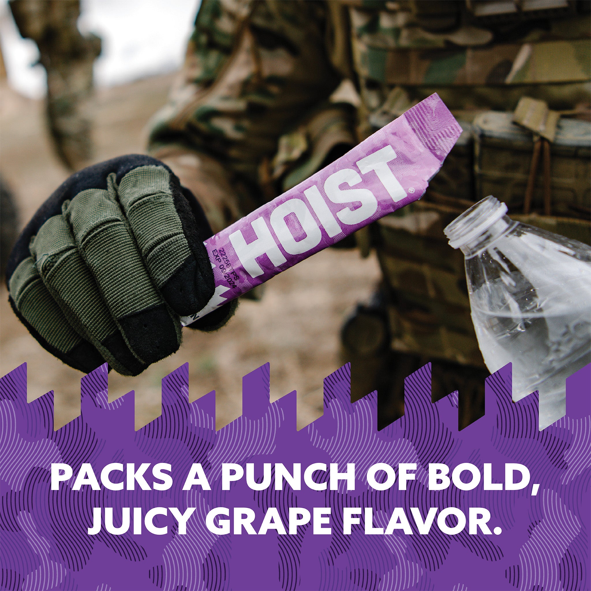 Hand holding a 'HOIST' product with a grape flavor description on a purple background